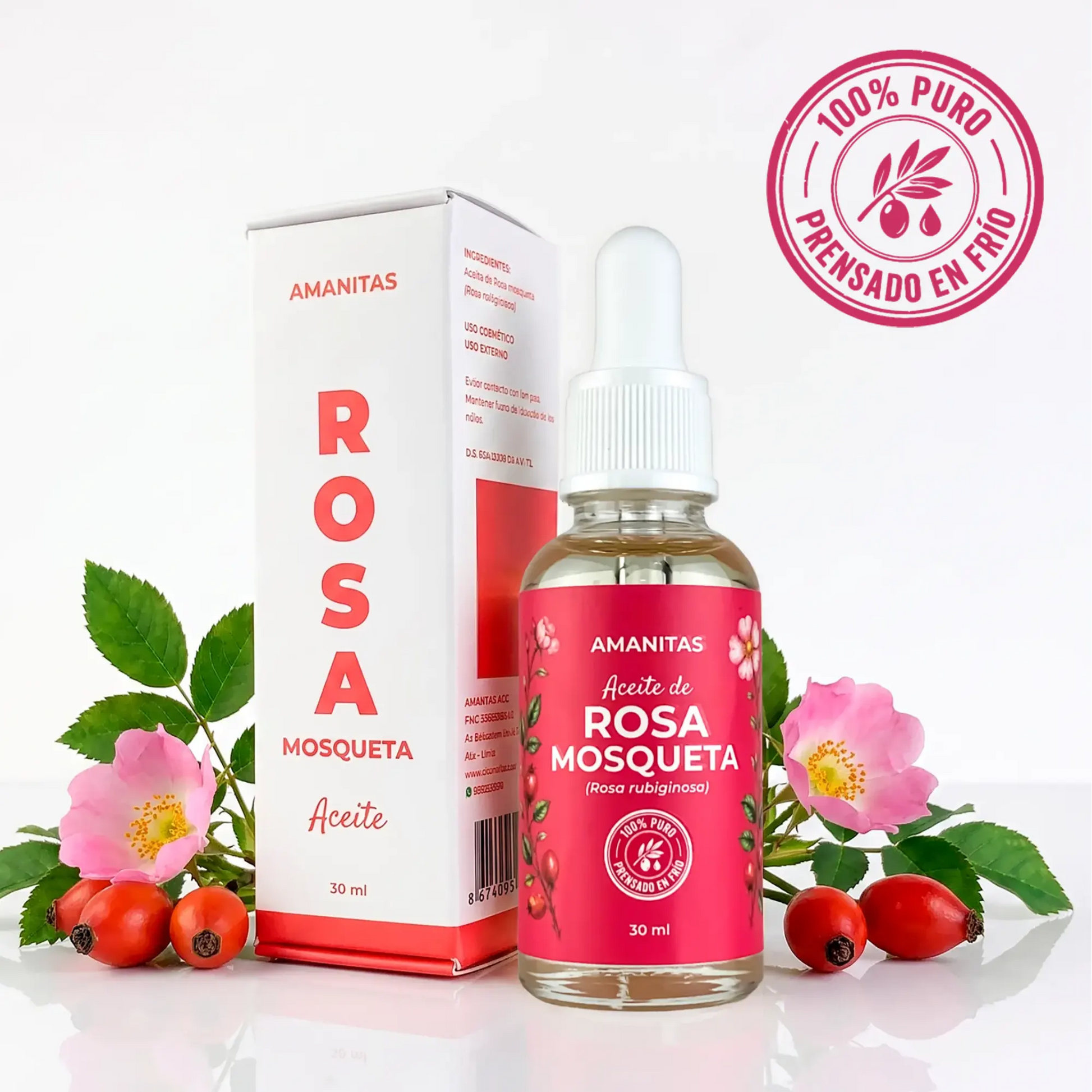 Caja y frasco de 30 ml del Aceite de Rosa Mosqueta de la marca Amanitas rodeado de flores y frutos de rosa mosqueta. Es un producto cosmético 100% puro y extraído mediante prensado en frío.